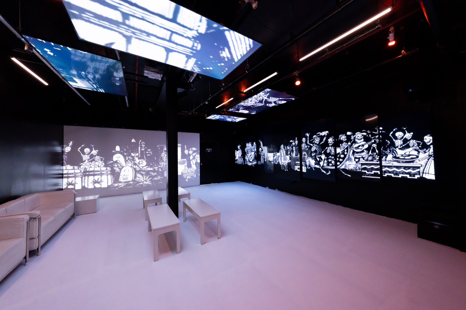 Basement Lounge with lighting panels overhead