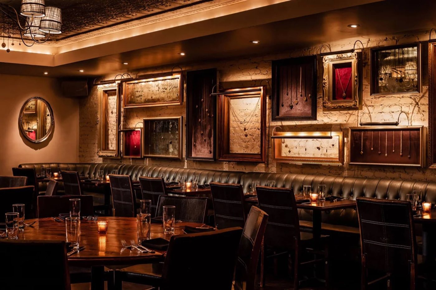 Locket Room with leather banquettes and walls hung with framed lockets