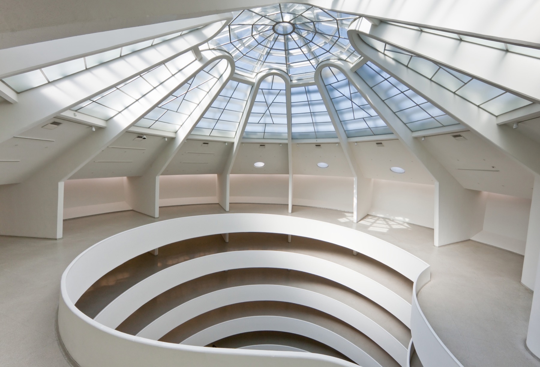 Skylight dome and spiral ramps of the rotunda seen from the top level