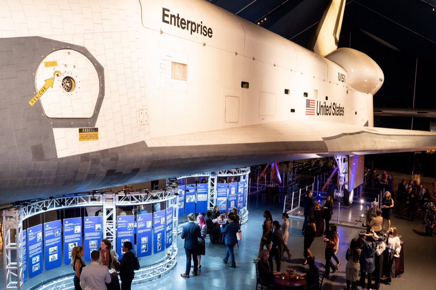 Reception beneath the space shuttle Enterprise inside the Space Shuttle Pavilion