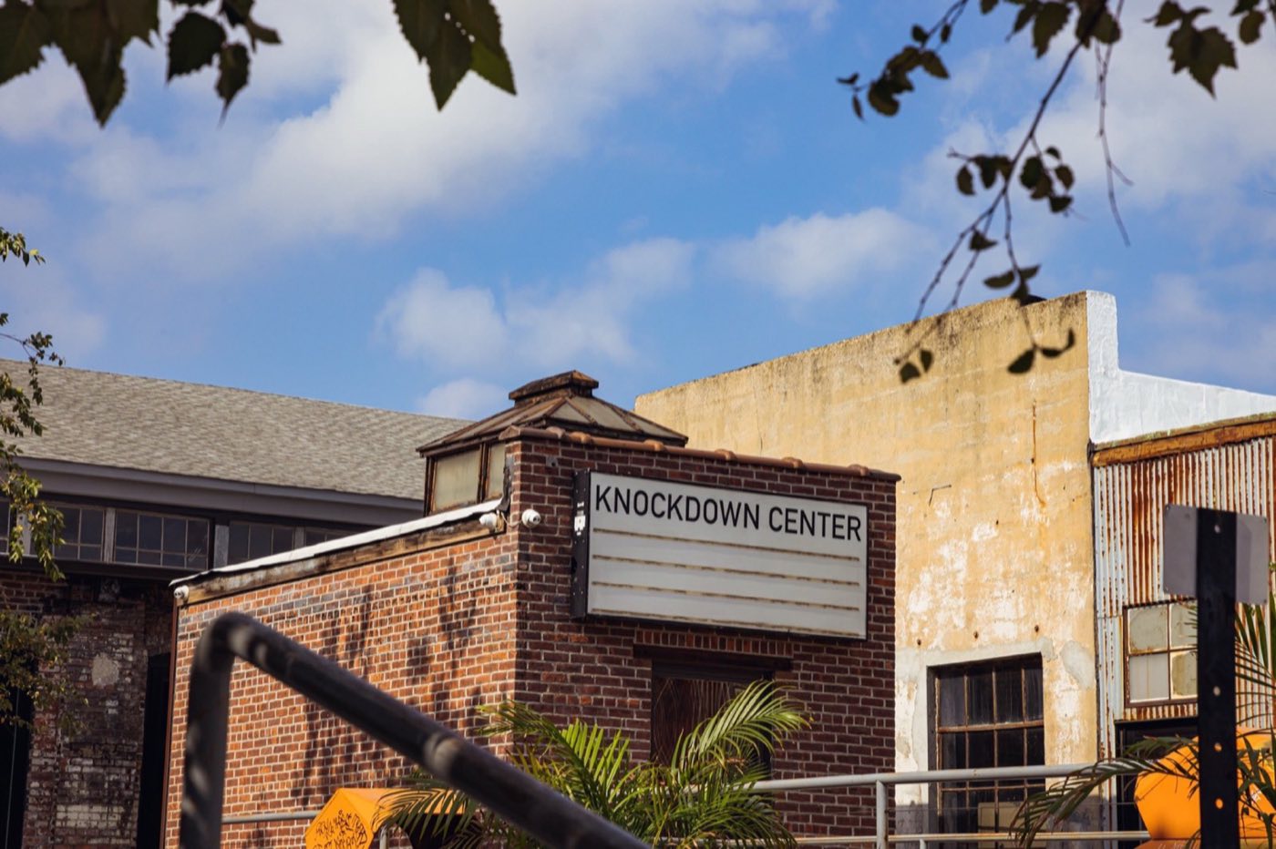 Street entrance of the former factory building with the Knockdown Center sign