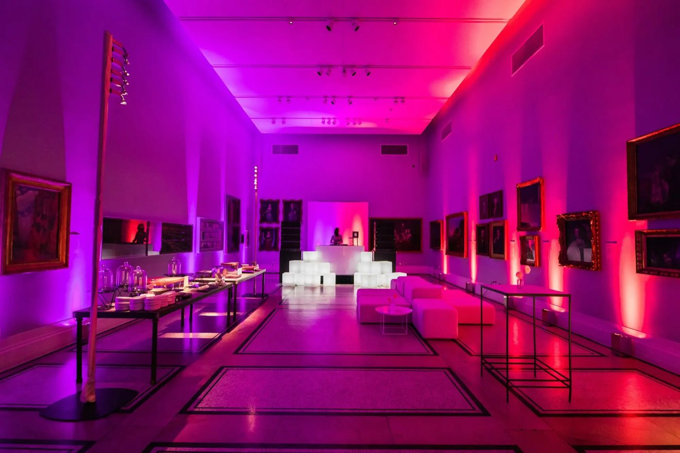 Dexter Hall reception with pink and red uplighting and lounge seating