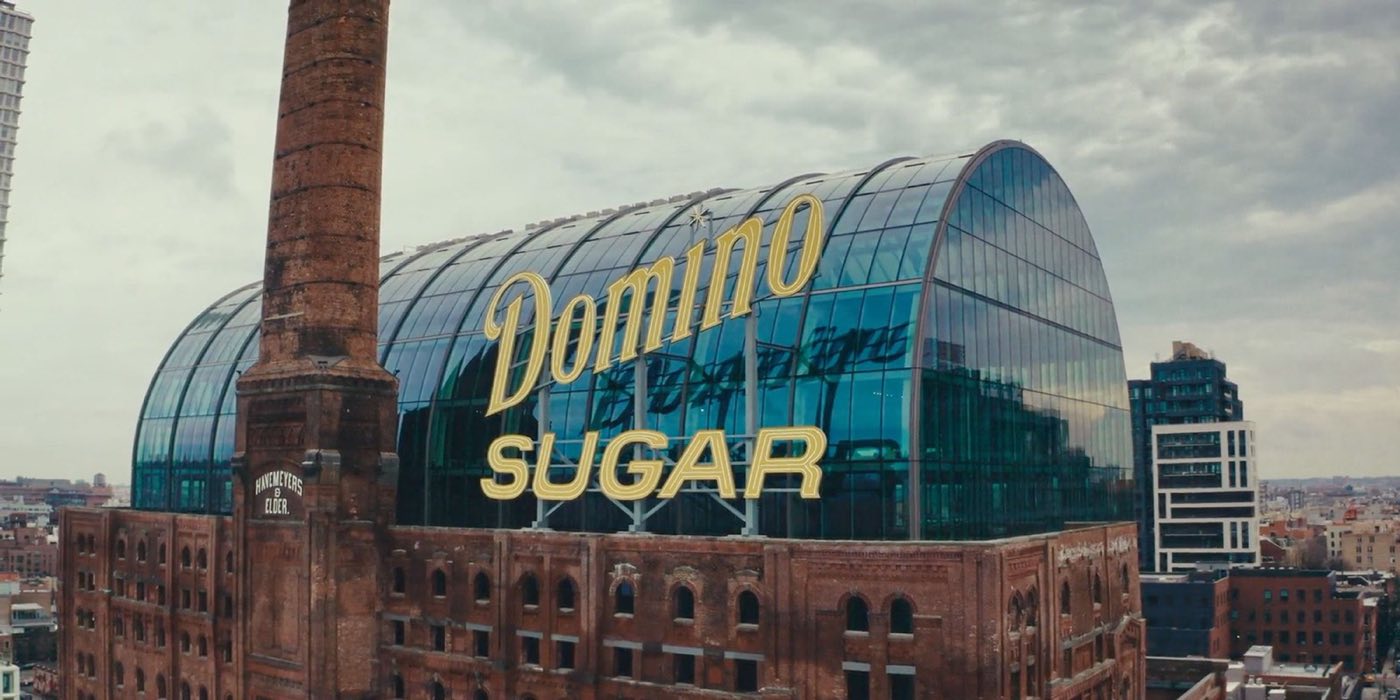 Glass dome atop the brick Domino Sugar refinery with the neon sign
