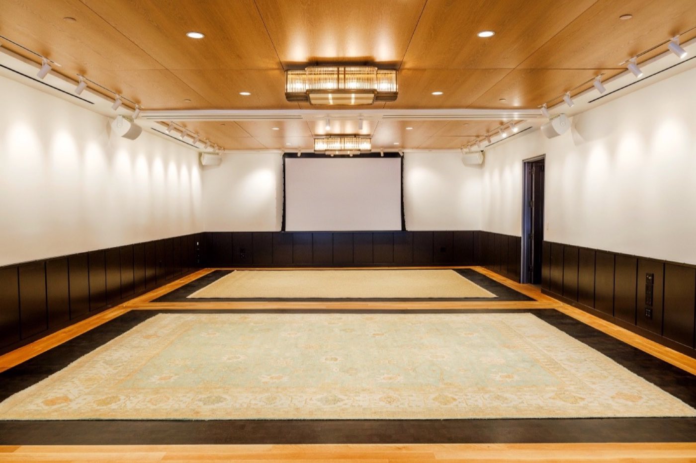 The Gallery with the projection screen lowered at the far end of the room