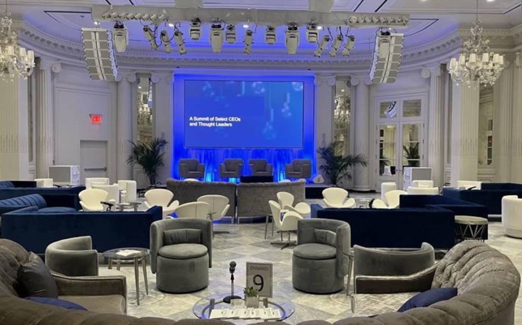 Grand Ballroom set as a lounge with a stage and large LED screen