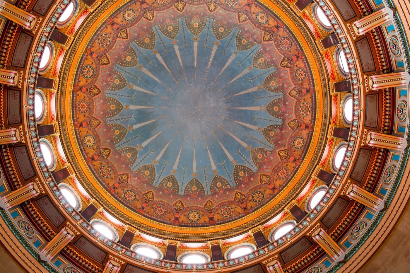 Painted and gilded dome ceiling seen from the rotunda floor